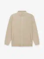 The Viscose Tricot Track Jacket is showcased on a white background. This beige jacket boasts a full-zip closure, a high collar, long sleeves, and two side pockets. Its minimalistic design is enhanced by its smooth texture.