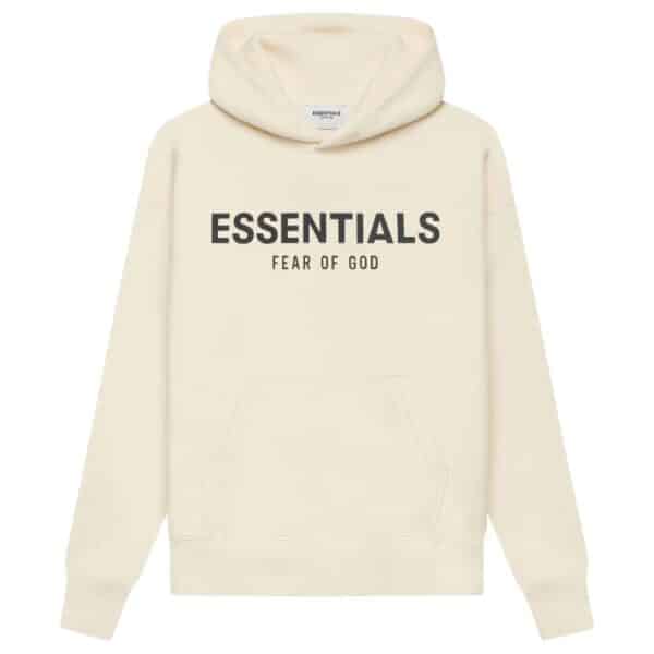 The Fear of God Essentials Oversized Hoodie 'Butter-Cream' showcases a cream-colored design with bold black ESSENTIALS text and FEAR OF GOD subtly printed beneath it. It includes a front pocket and a drawstring hood.