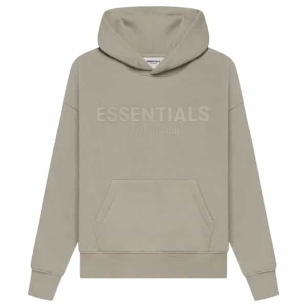 The Fear of God Essentials Pullover Hoodie 'Core-Heather' is a beige hoodie featuring ESSENTIALS and FEAR OF GOD embroidered on the front. It includes a front pocket and a hood, displayed against a plain white background.