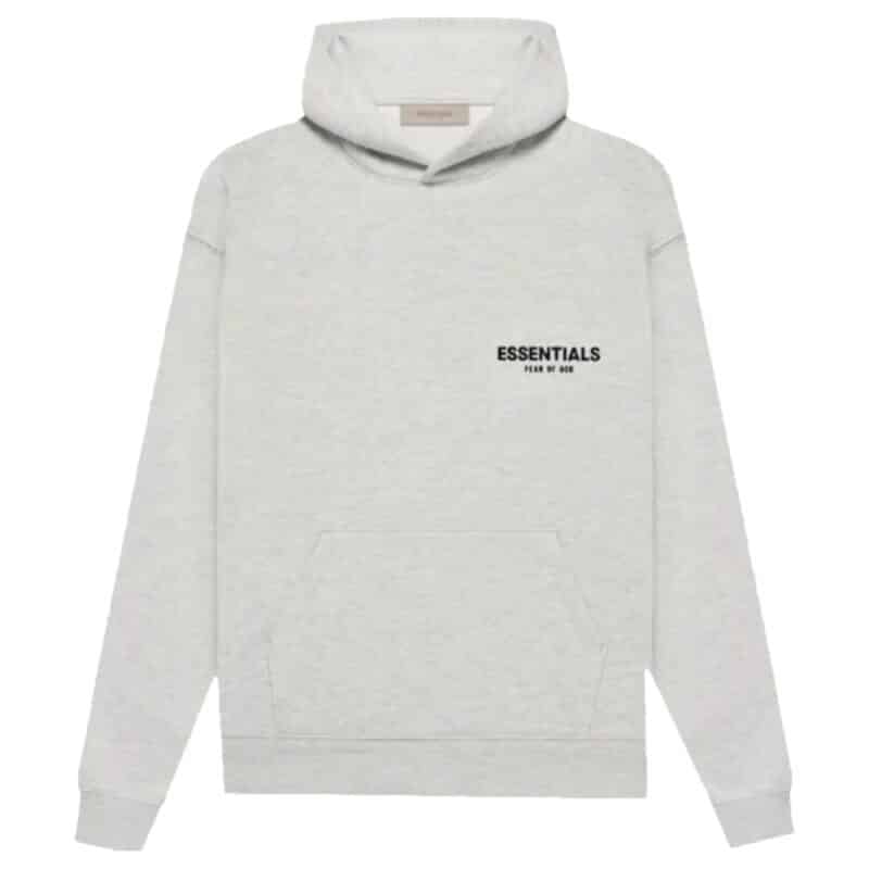 A Fear of God Essentials Hoodie in light gray featuring a kangaroo pocket, with the word "ESSENTIALS" printed in black on the upper left chest and underlined by smaller text, complete with a hood and drawstring.