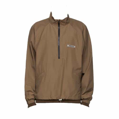 The Essentials x SSENSE Half Zip Track Jacket is brown with a zipper running down the center and elastic cuffs. It features a high collar and a small rectangular logo patch on the chest, offering a simple, classic style with a loose fit.