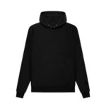 The Fear of God Essentials FG7C Hoodie 'Black' showcases a high collar and long sleeves. This plain black hoodie is accented with ribbed cuffs and hem, and it includes a small design or logo on the lower sleeve. The hood is up, adding to the sleek look against a plain white background.